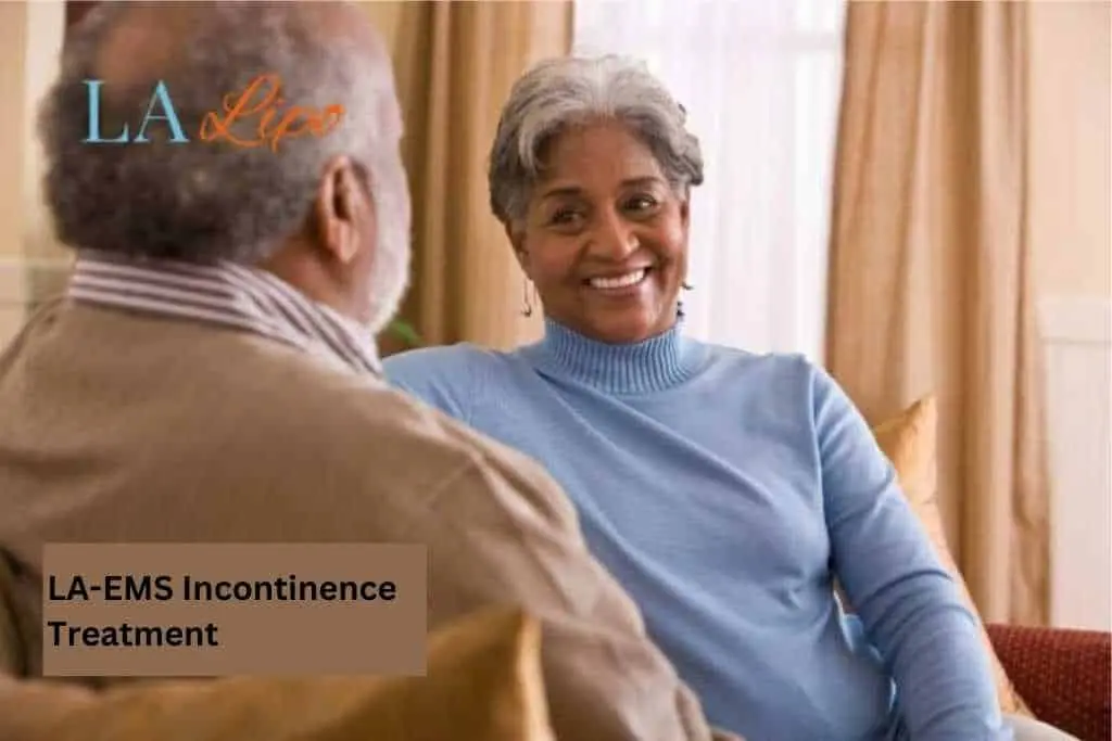 Couple sat smiling at each other - LA-EMS treatment Greater London (Brent)