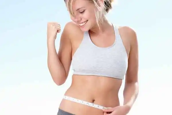 woman happy after fat reduction treatment Greater London (Brent)