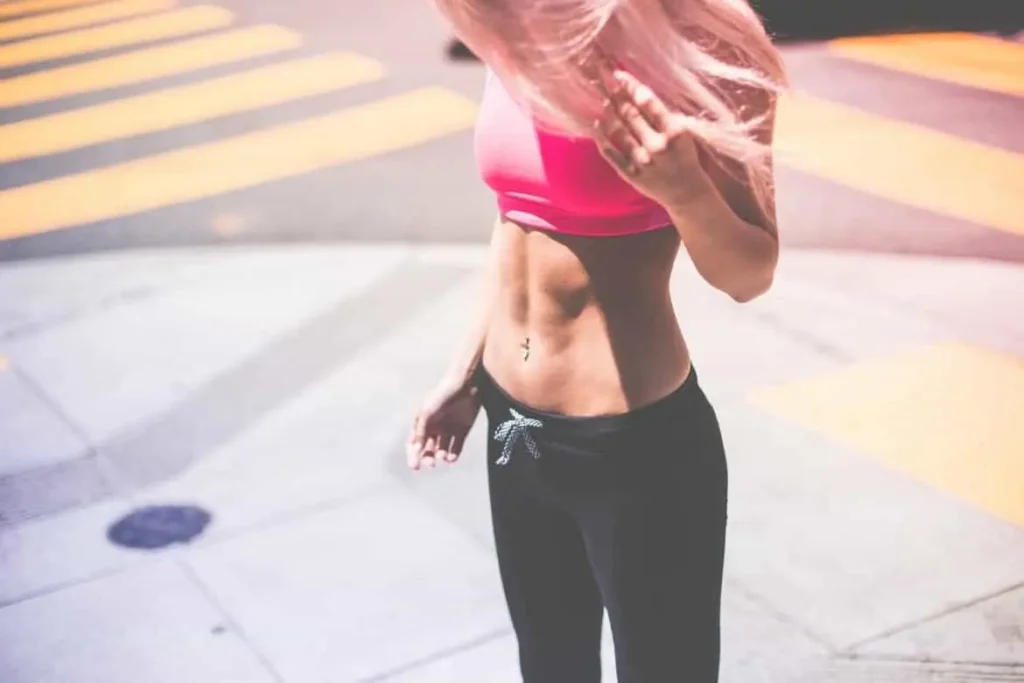 Woman with toned stomach after LA-EMS Body Sculpting Treatment Greater London (Brent) 